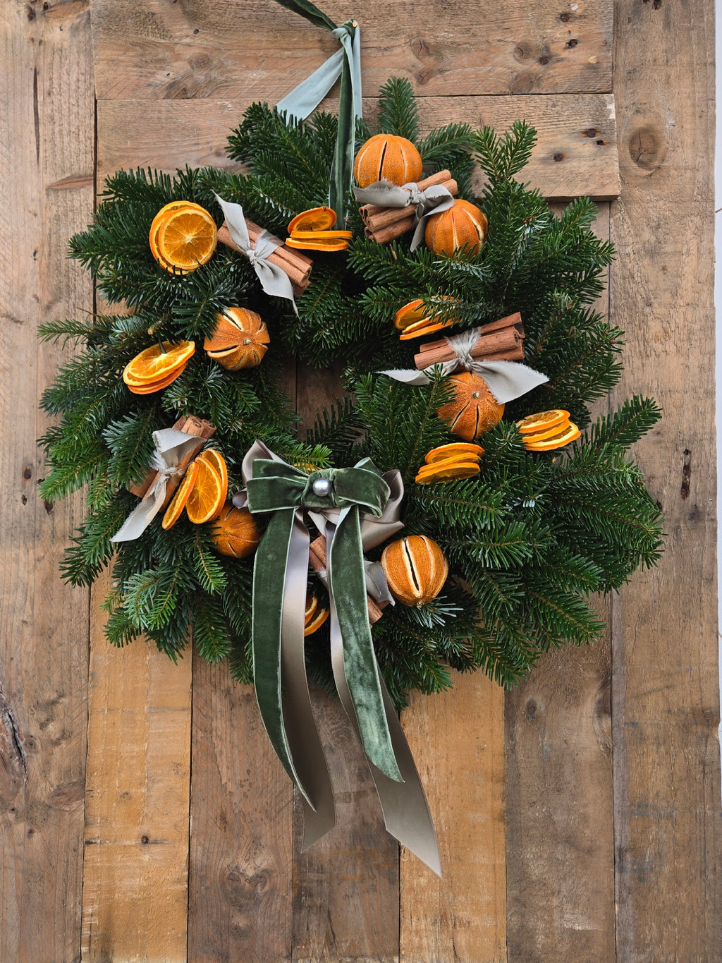 Luxury Orange and Cinnamon Scented Christmas Wreath with Sage Green Ribbons, Cinnamon Bundles and Dried Oranges £85